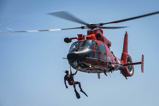 U.S Coast Guard MH-65 Dolphin Search & Rescue (SAR) (Photo by Senior Airman Sean Sweeney Courtesy of the 20th Fighter Wing Public Affairs)
